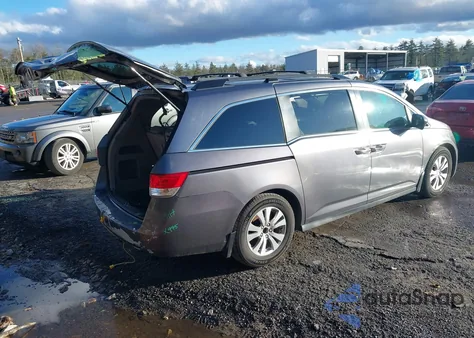 2014 Honda Odyssey Ex-L z USA, uszkodzony, nr VIN 5FNRL5H67EB009341